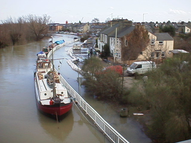 Sandbags and pumps keep the water at bay