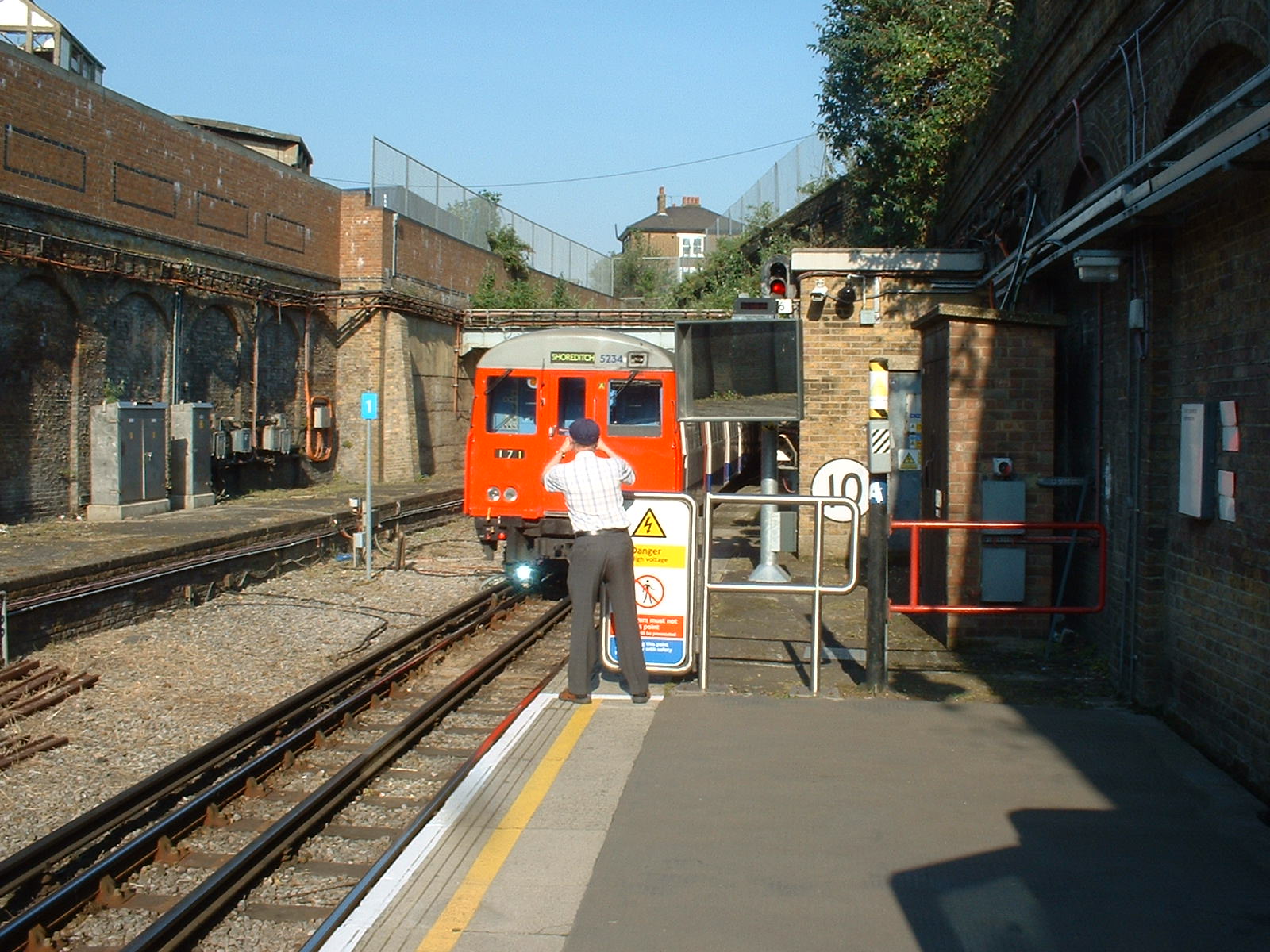 A stock train departing Shoreditch about 17:45