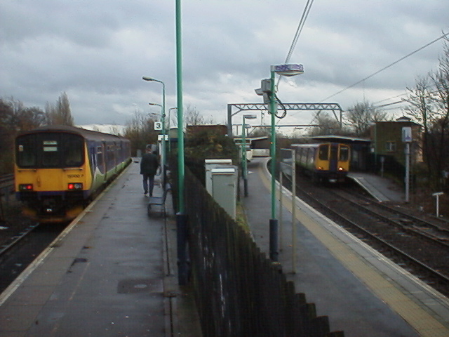 With a passing North London Class 313 unit