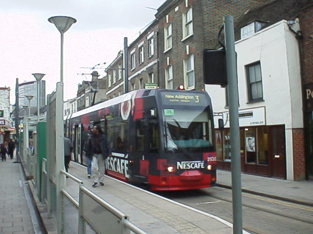 2533 in all-over Nescaf� colours on the Croydon loop at Church Street